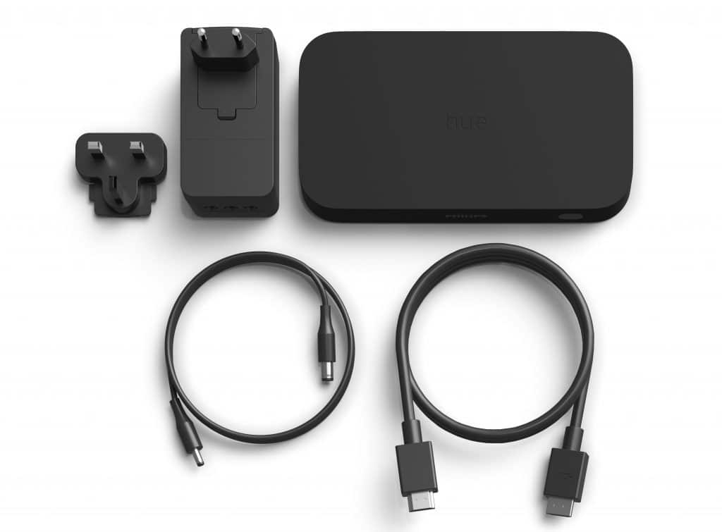 Lieferumfang mit Philips Hue Play HDMI Sync Box, Netzadapter (3 Ports), Netzkabel und einem HDMI-Kabel