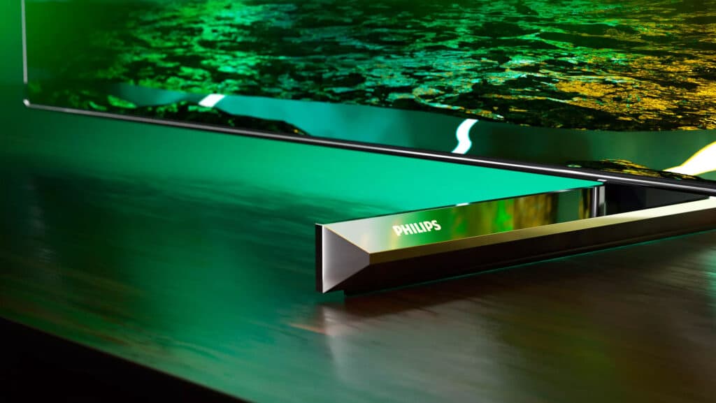 Schickes schlankes Design. Der OLED-Bildschirm wird mit schlankem Rahmen wird von zwei Metall-Standfüßen "gehalten"