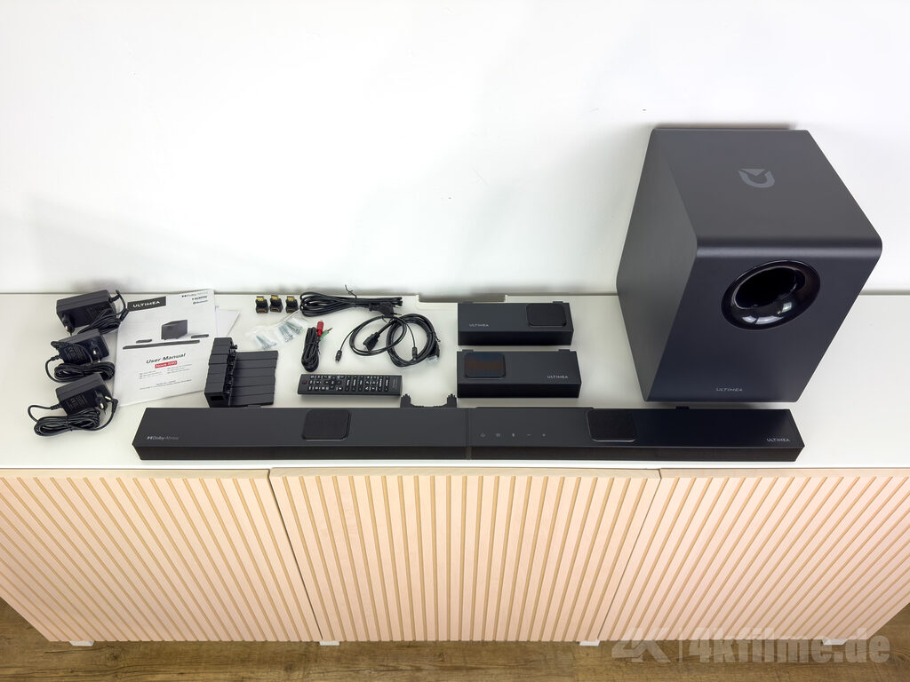 Der komplette Lieferumfang der Ultimea Nova S90 Dolby Atmos Soundbar mit Subwoofer und Rear-Lautsprecher