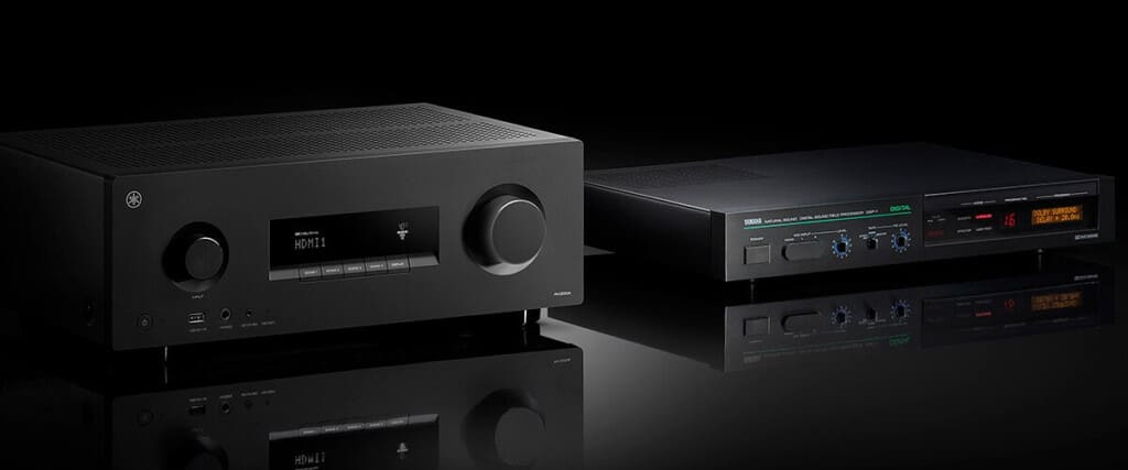 In jedem Yamaha-Produkt schwingt die Tradition mit. Links der günstige Einstiegs-AV-Receiver RX300A, rechts der erste Verstärker DSP-1 aus dem Jahr 1986.