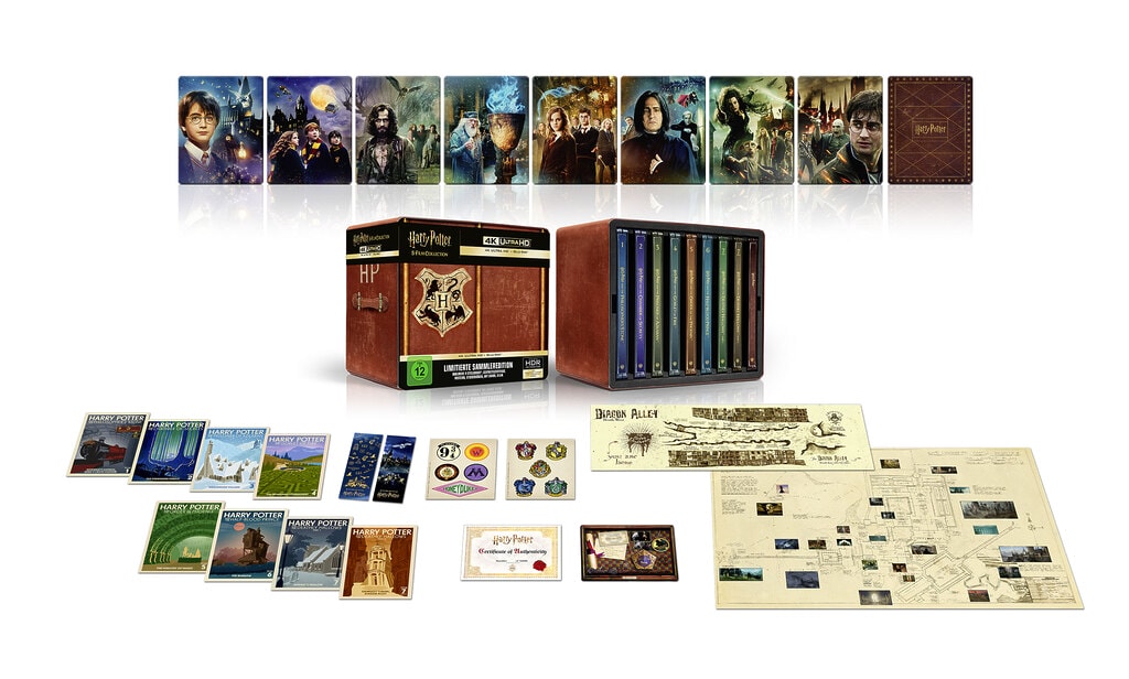 Detailansicht der Harry Potter 8-Film-Collection im Library Case, 4K Steelbooks sowie Bonusinhalte und Goodies.